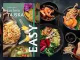Książka "Kuchnia Tajska. Najlepsze przepisy" z apetycznymi daniami, takimi jak Pad Thai i zielone curry. Odkryj smaki Azji!